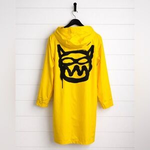 nununu Yellow Long Raincoat with Black Mischief Cat Graphic